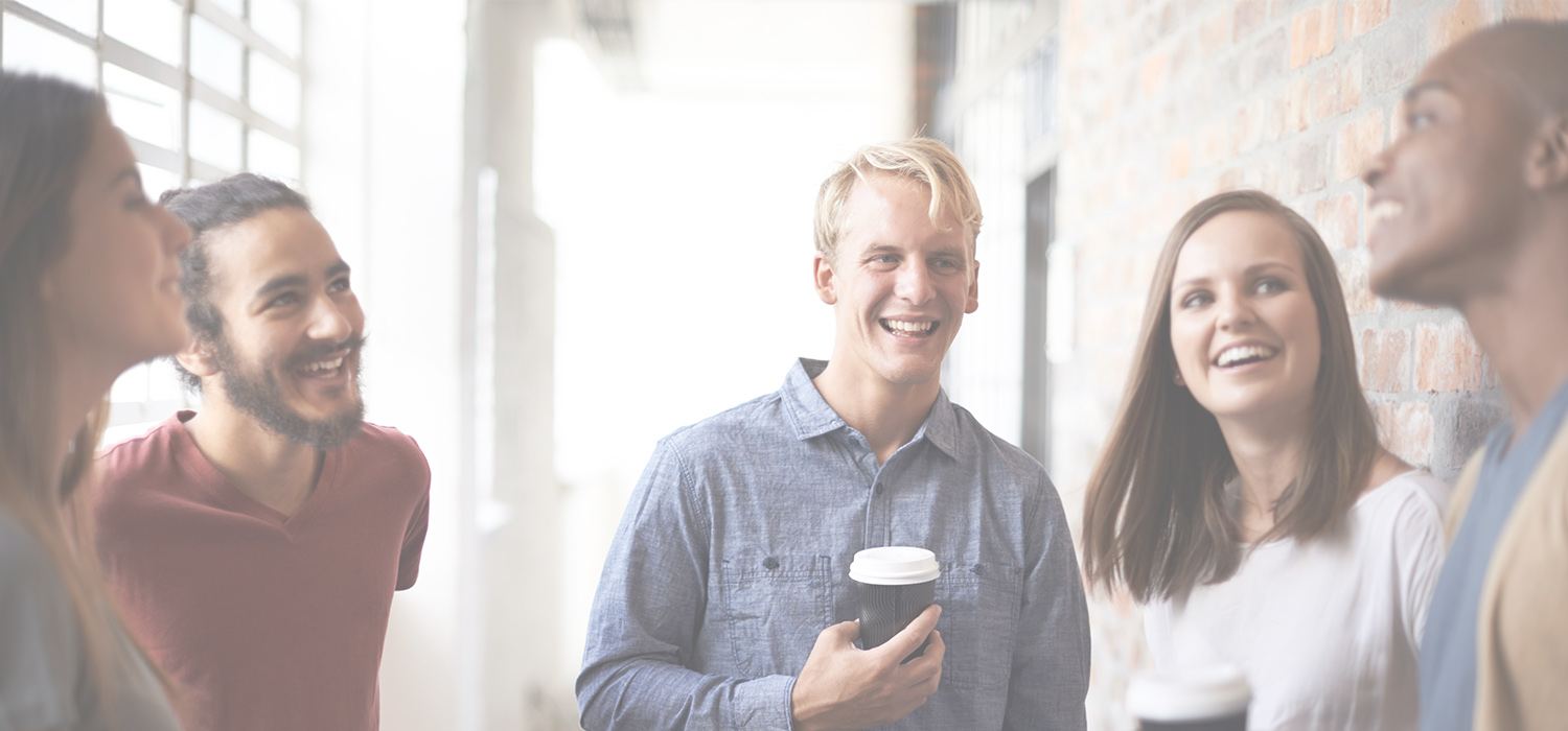Group of young adults laughing together